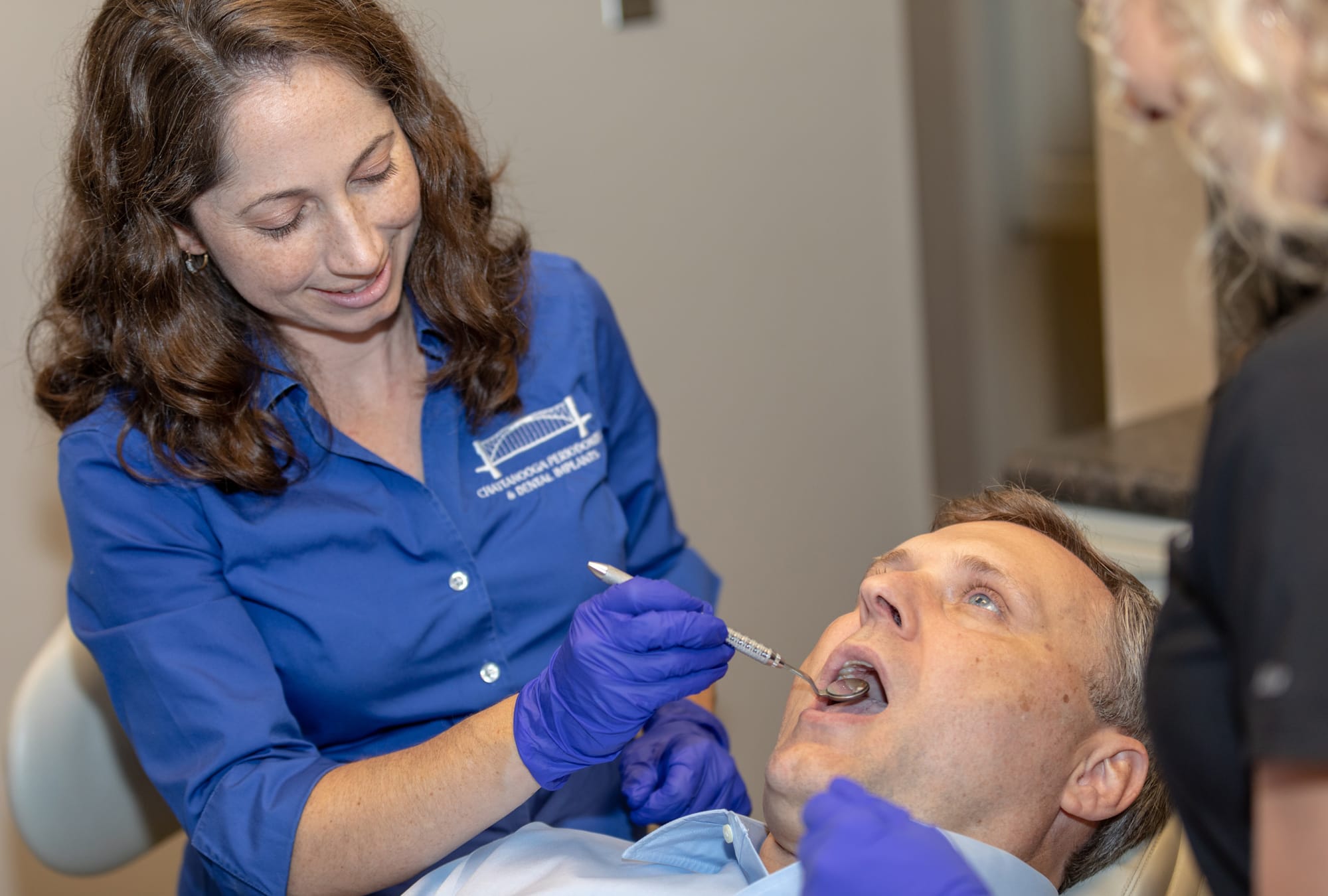 Dr Elizabeth examining a patient at Dr Felts Office Chattanooga TN